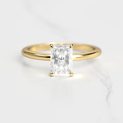 Radiant tapered solitaire moissanite ring