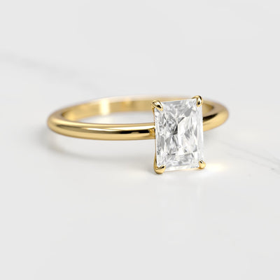 Radiant tapered solitaire moissanite ring