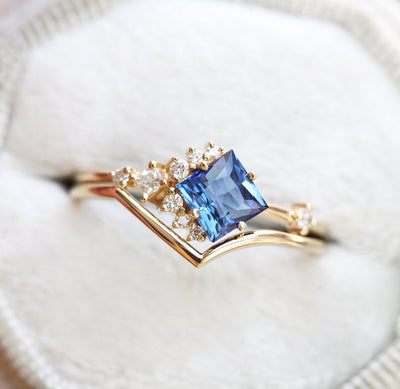 Mint-colored square sapphire with side diamonds