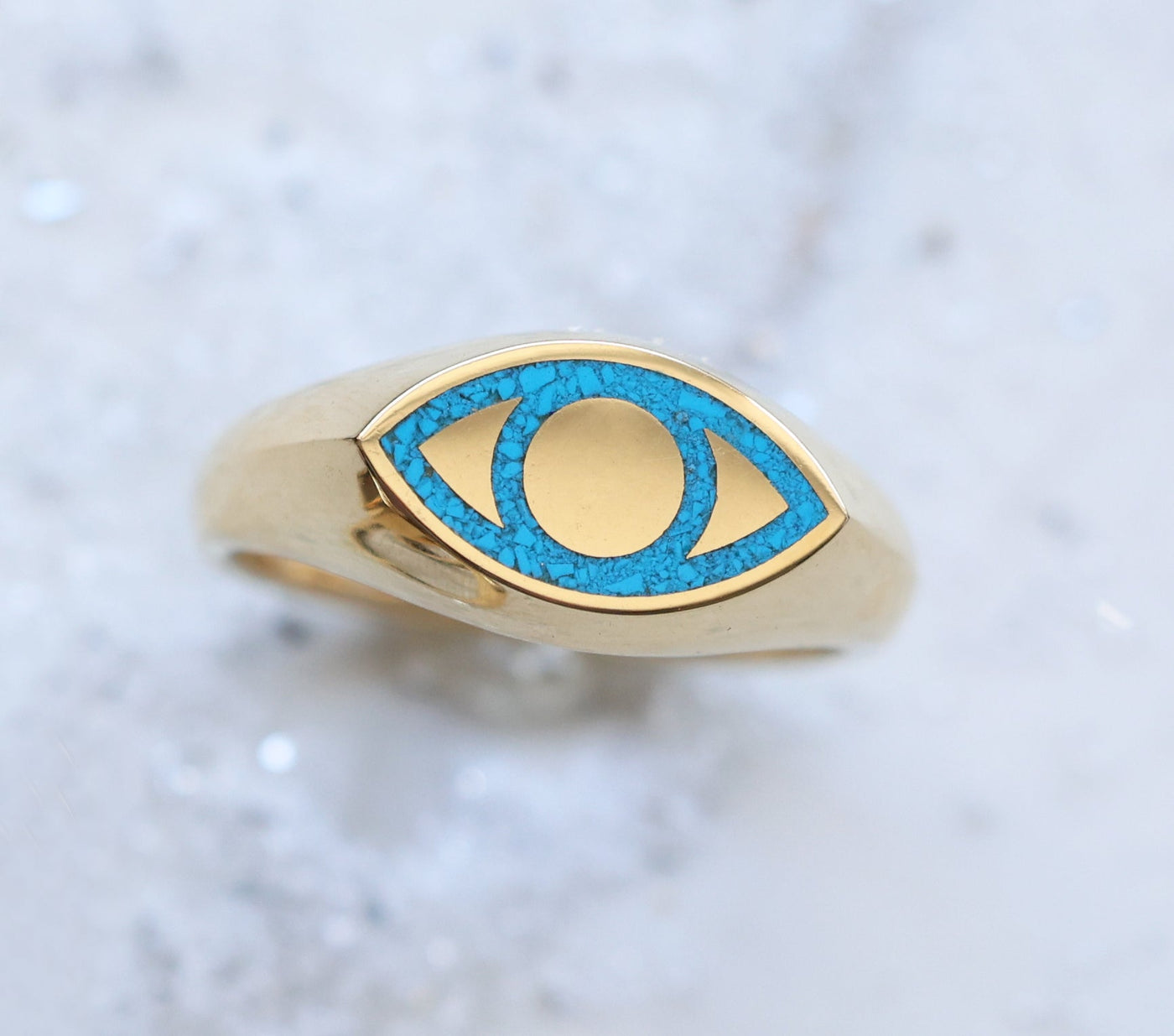 Gold signet ring with turquoise inlay, 8mm front width, polished finish, customizable gemstones.