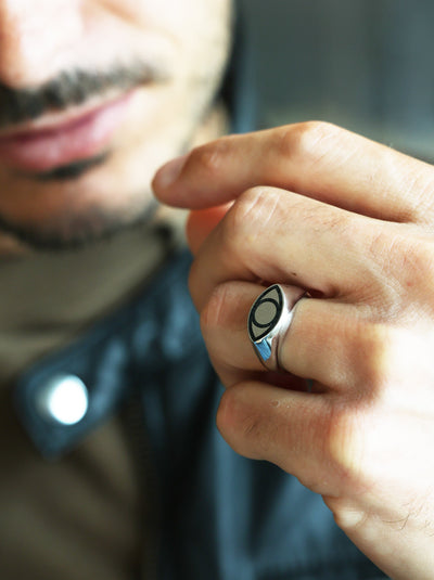 Unisex gold signet ring with black spinel inlay, 10mm front, 3mm back. Polished finish, natural black spinel, 14k/18k gold or platinum. Customizable gemstones. Free insured shipping from Europe.