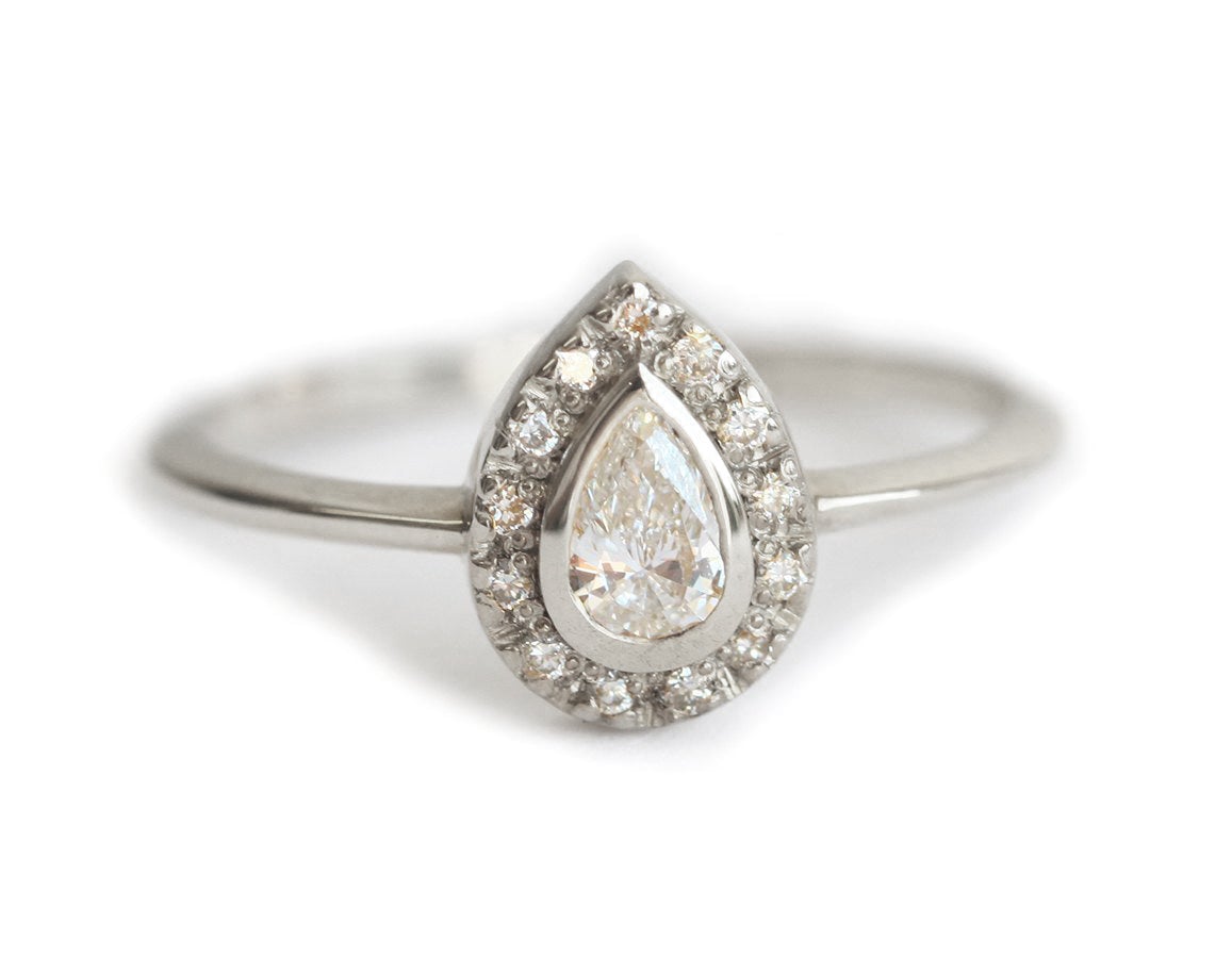 Pear White Diamond Halo Engagement Ring with Full Diamond Halo Around the Centerpiece