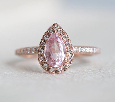 Pear-shaped pink ceylon sapphire ring with diamond halo