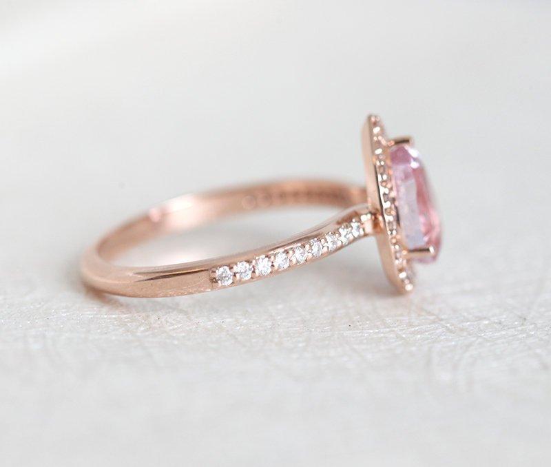 Pear-shaped pink ceylon sapphire ring with diamond halo