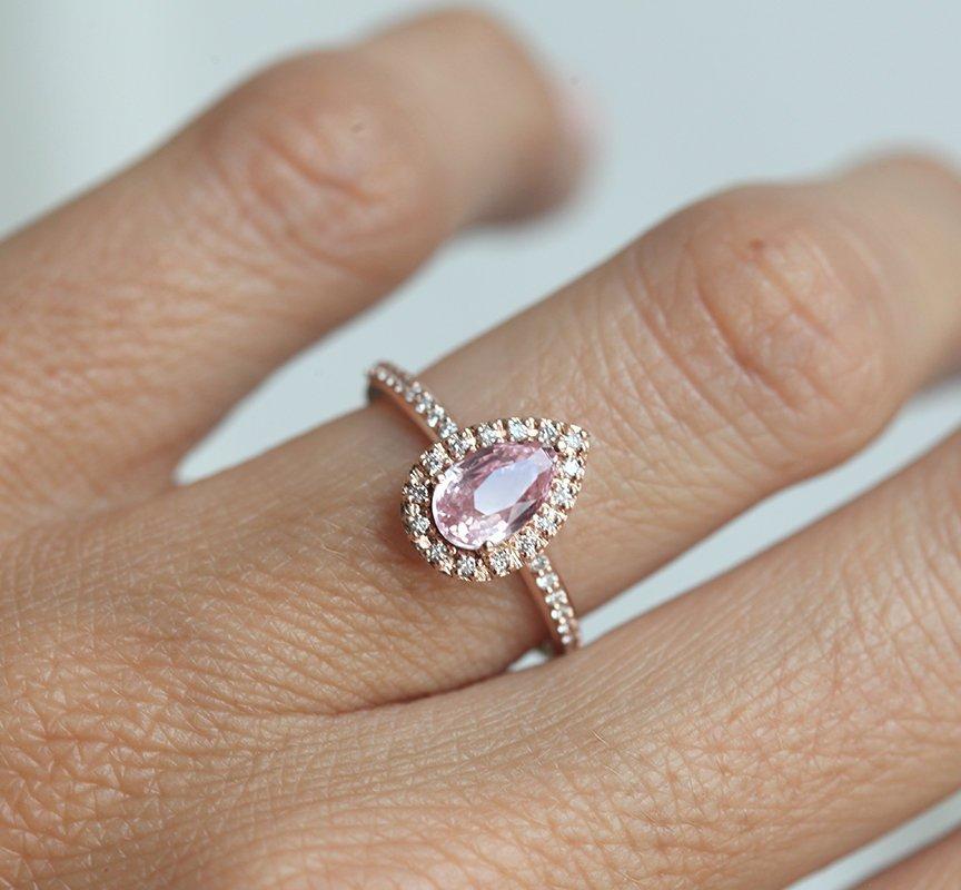 Pear-shaped pink ceylon sapphire ring with diamond halo