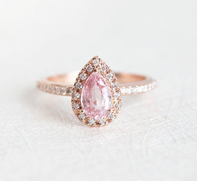 Pear-shaped pink ceylon sapphire ring with diamond halo