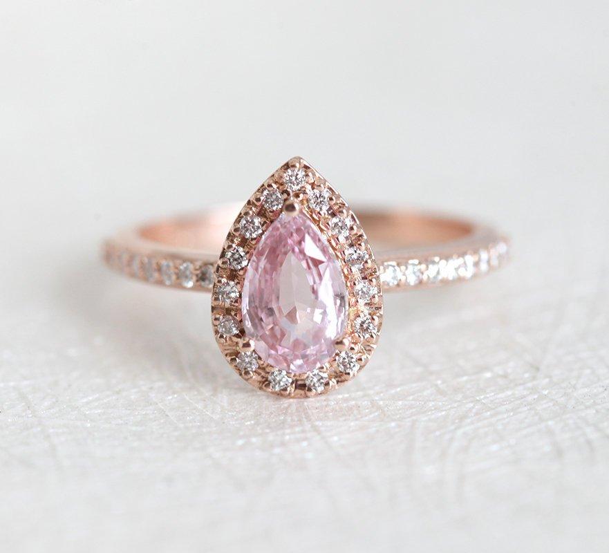 Pear-shaped pink ceylon sapphire ring with diamond halo