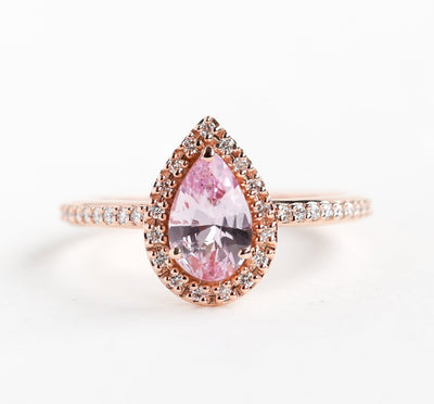 Pear-shaped pink ceylon sapphire ring with diamond halo