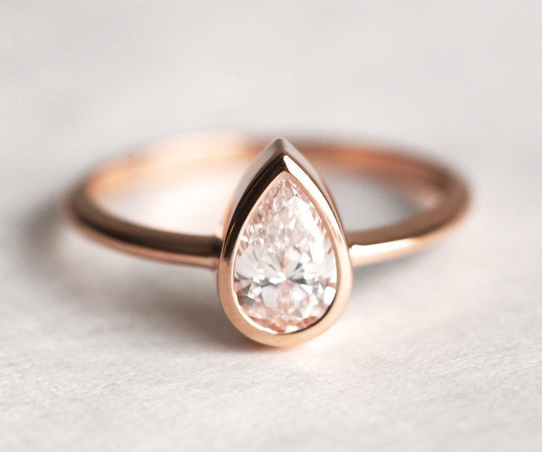 Pear White Diamond Solitaire Ring