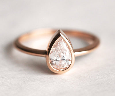 Pear White Diamond Solitaire Ring