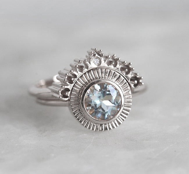 Nesting Style Round Aquamarine Ring with a small Round White Diamond on Top