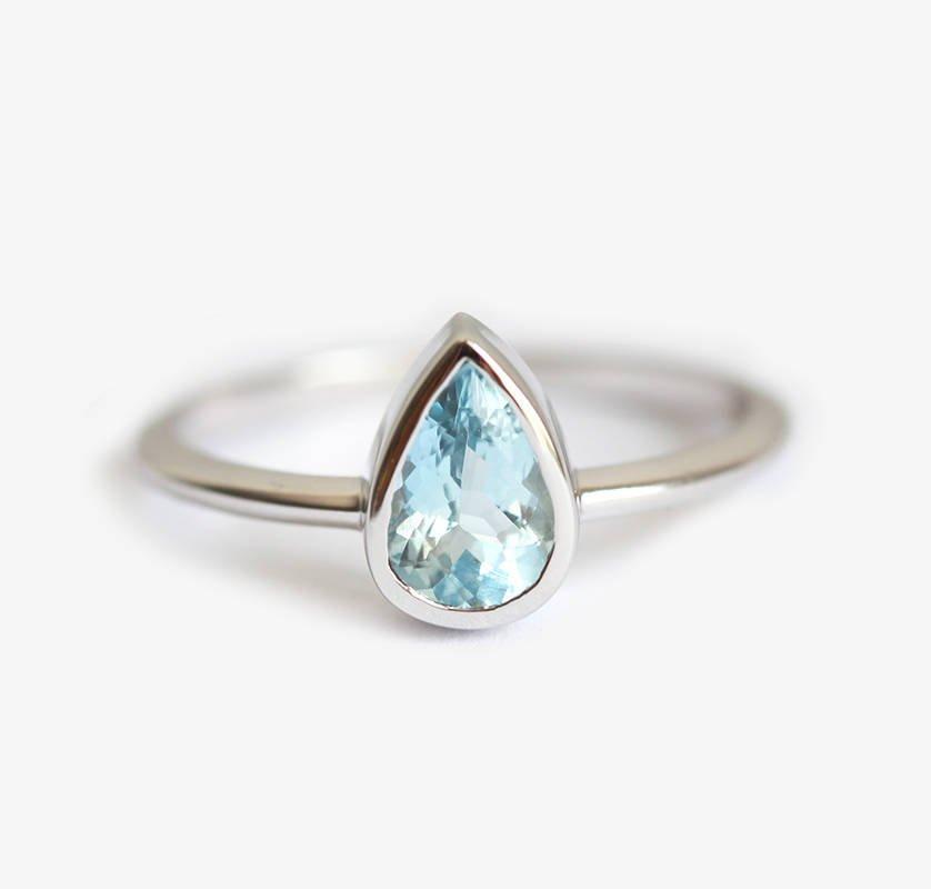 Pear-shaped solitaire-style aquamarine ring