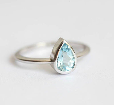 Pear-shaped solitaire-style aquamarine ring