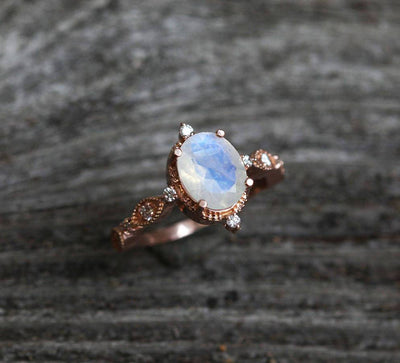 Oval Moonstone Vintage Eye-Shape Rose Gold Engagement Ring with Side Round White Diamonds