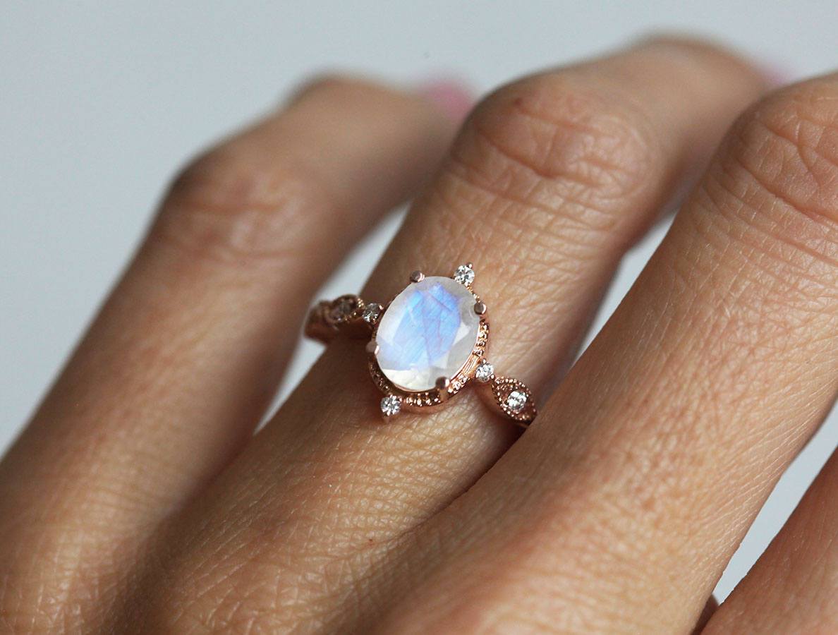 Oval Moonstone Vintage Eye-Shape Rose Gold Engagement Ring with Side Round White Diamonds