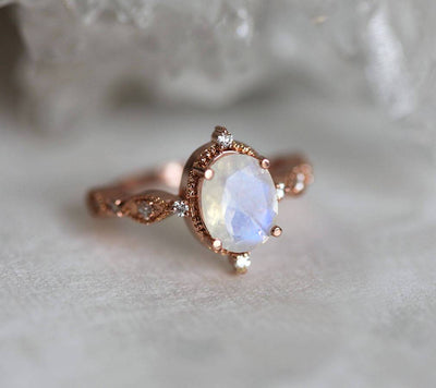 Oval Moonstone Vintage Eye-Shape Rose Gold Engagement Ring with Side Round White Diamonds