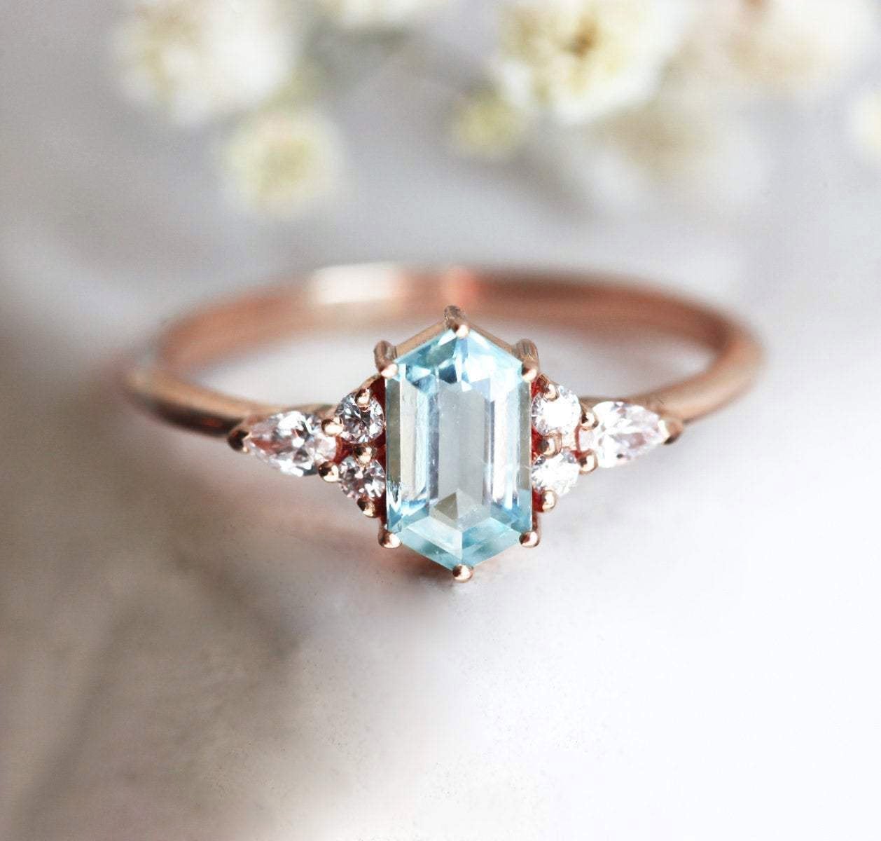 Blue Hexagon Aquamarine Ring with Side Round and Pear White Diamonds
