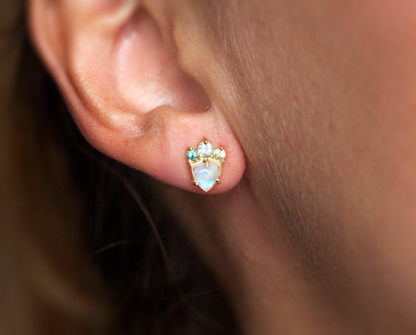 White trillion-shaped moonstone earrings with sapphire studs