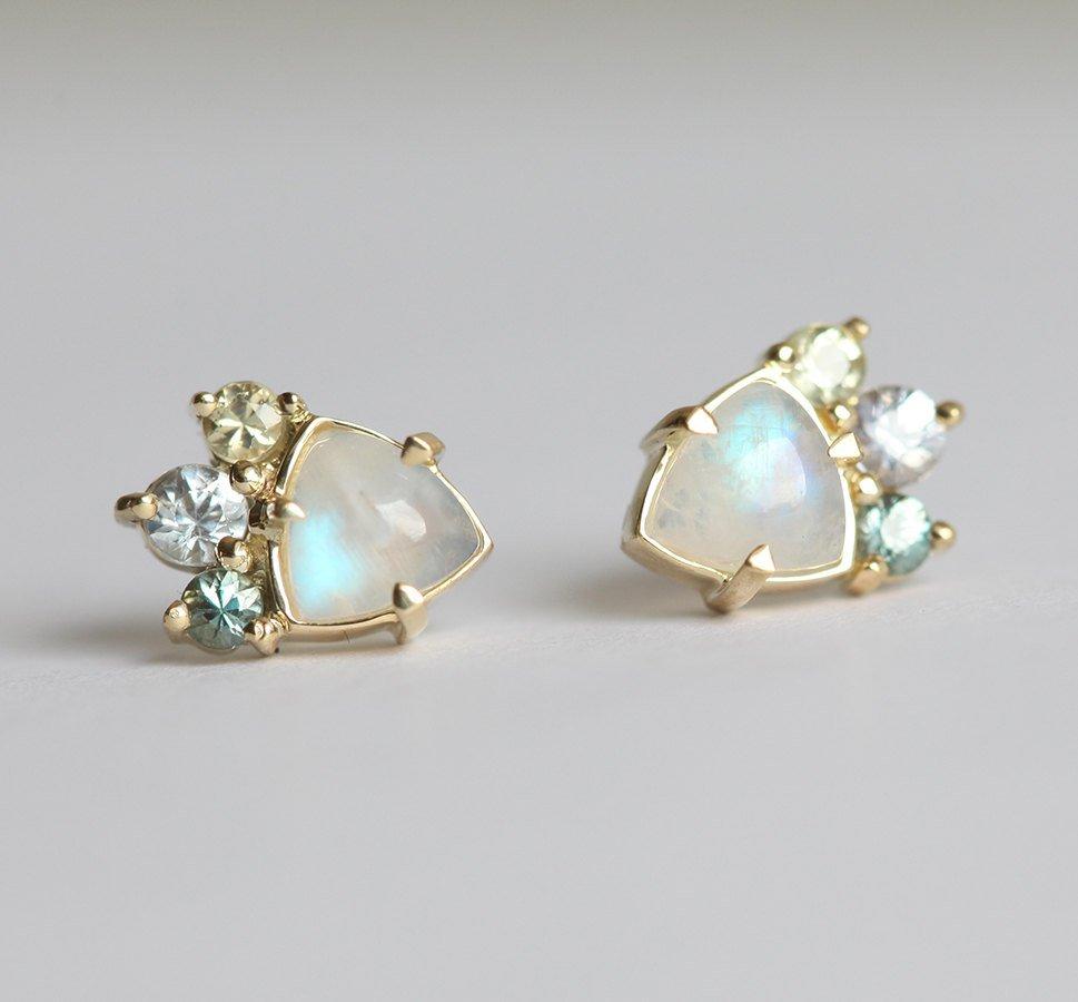 White trillion-shaped moonstone earrings with sapphire studs