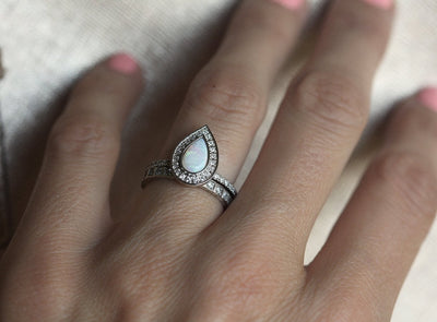 White Pear Opal Halo Ring with White Diamonds and Eternity Diamond Band