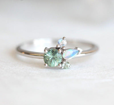 Green round sapphire ring with opal and diamond cluster