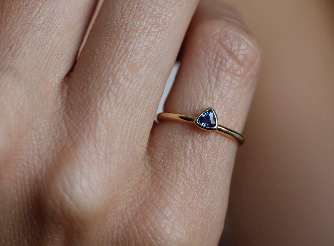 Trillion-shaped blue sapphire ring