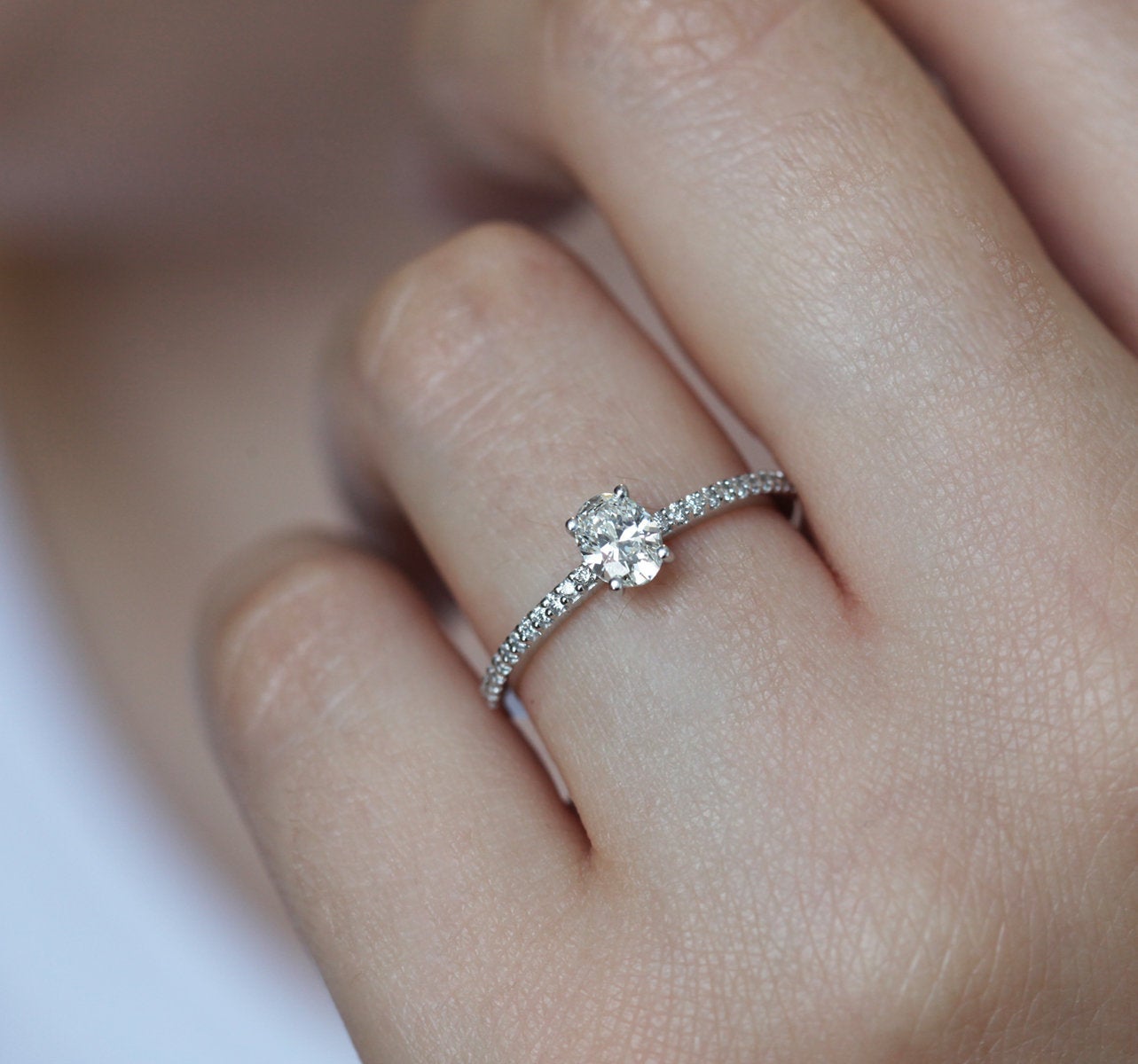 BELEN DIAMOND RING-CapucinneOval White Diamond with half eternity pave diamond ring