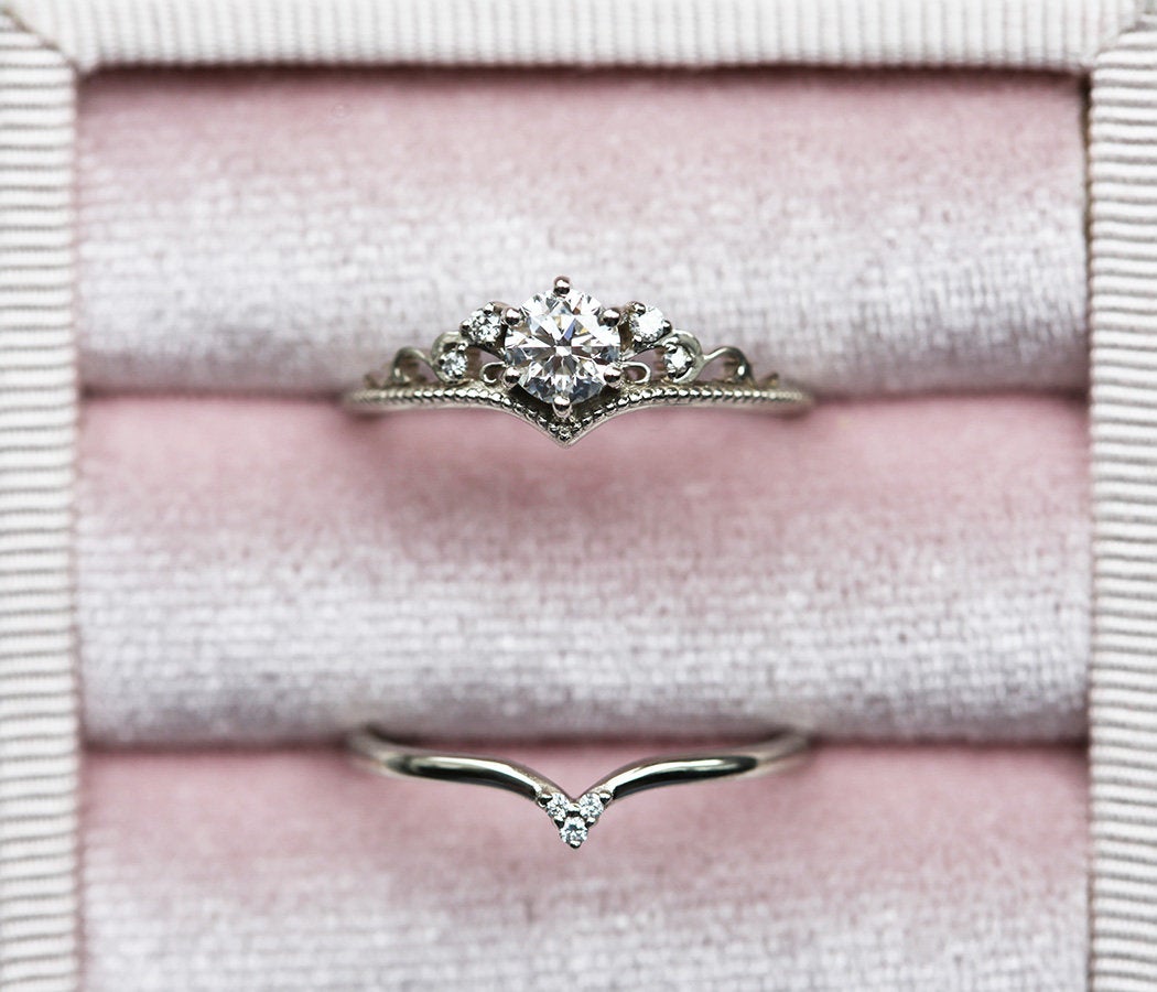 Elegant Round White Diamond Prong Wedding Ring with intricate side White Diamonds