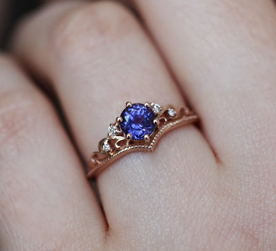 Vintage round purple sapphire ring with diamond cluster