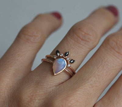 Simplistic Design Solitaire Pear Australian Opal Ring with Complementary Black and White Diamond Ring