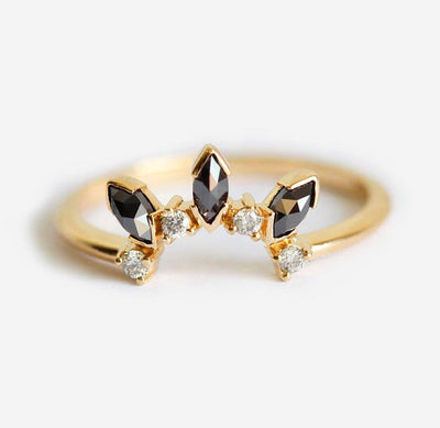 Black marquise-cut diamond ring in floral setting