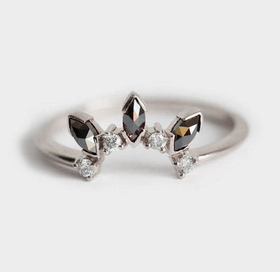 Black marquise-cut diamond ring in floral setting
