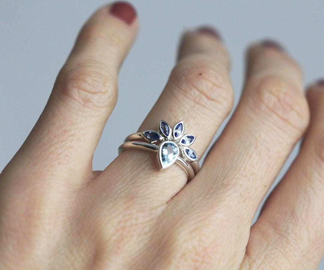 Nested marquise-shaped blue sapphire wedding ring