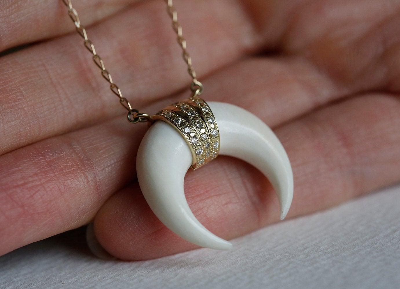 White horn crescent moon gold necklace