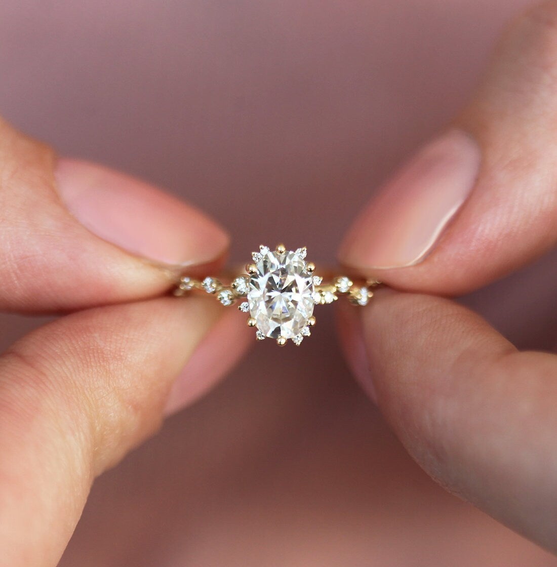 Oval White Diamond Cluster Ring with Side White Round Diamonds Placed like a vine leading to the center stone