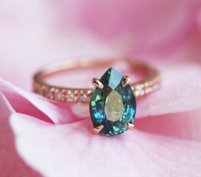 Nested pear-shaped teal sapphire ring
