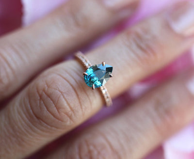 Nested pear-shaped teal sapphire ring