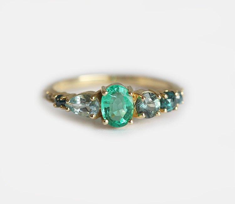 Oval Emerald Cluster Ring with White, Blue Diamonds, Sapphire and Aquamarine Stones