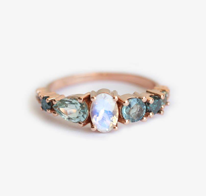 Oval Moonstone Cluster Ring with Pear Aquamarine, Round Sapphire Stones and Blue Diamonds
