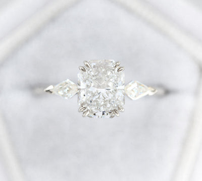 3-Stone Unique Radiant Cut White Diamond with 2 Side Kite Diamonds