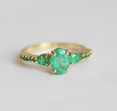 Oval Emerald Cluster Ring with 2 Horizontal Placed Pear Emeralds and Emeralds on the Band