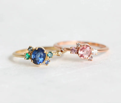 Pink and blue oval sapphire rings with cluster diamonds and amethyst
