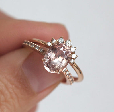 Pink oval sapphire ring with side diamonds