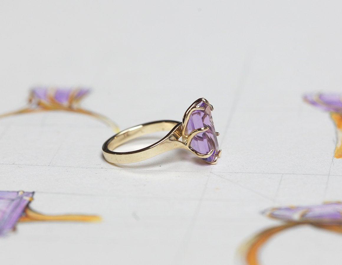 Baguette Amethyst Solitaire Gold Ring with Unique Bezel