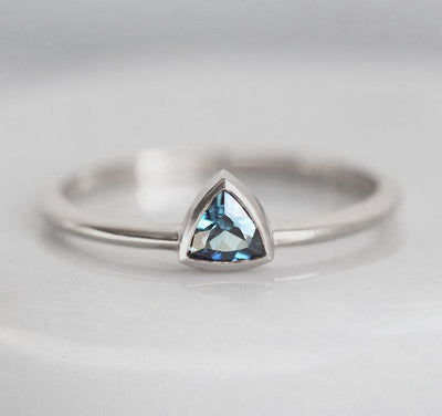 Trillion-shaped teal sapphire ring