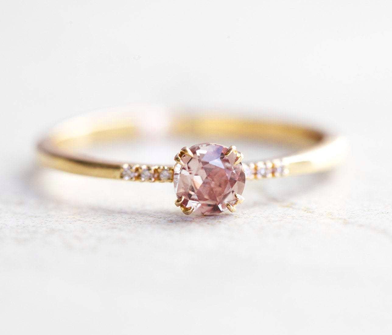 Round champagne-colored sapphire ring with side diamonds