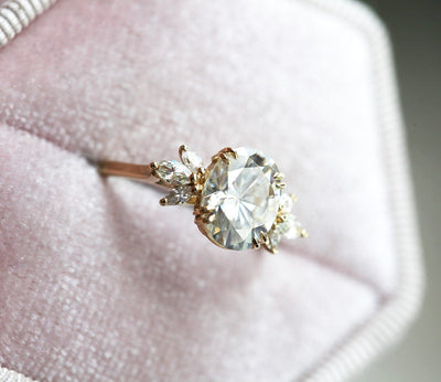 Oval White Diamond Engagement Ring with Side Marquise-Cut White Diamonds