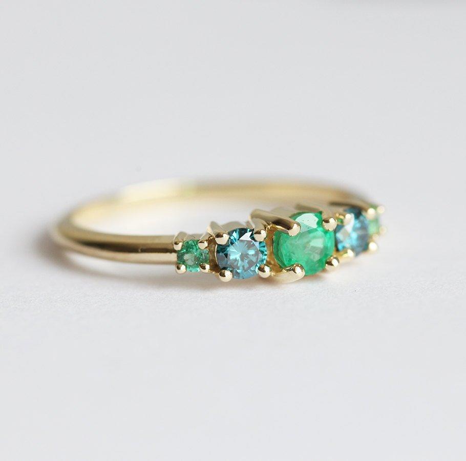 Round Emerald Cluster Ring with 2 Side Blue Diamonds and 2 Side Round Emeralds