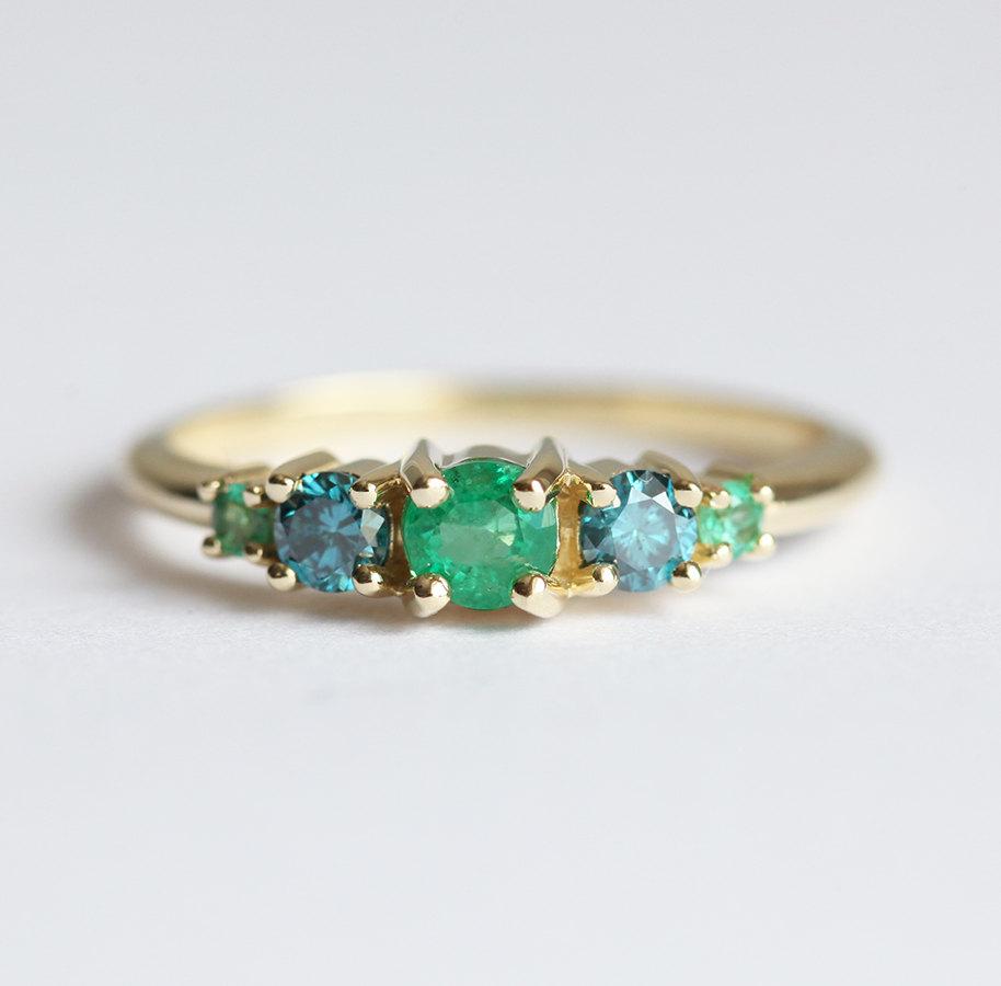 Round Emerald Cluster Ring with 2 Side Blue Diamonds and 2 Side Round Emeralds