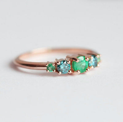 Round Emerald Cluster Ring with 2 Side Blue Diamonds and 2 Side Round Emeralds